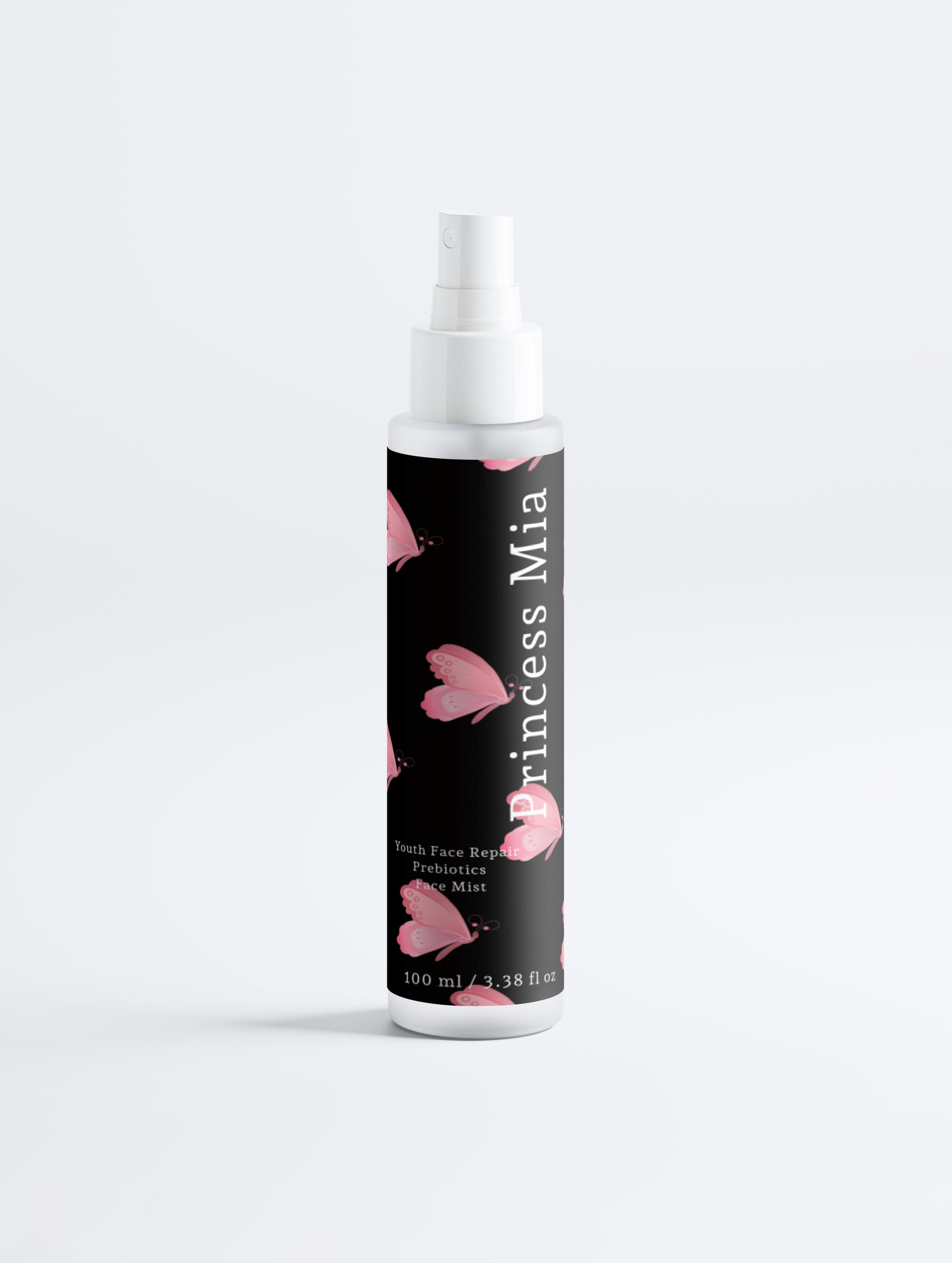 Spray bottle with black label featuring pink hearts on a white background