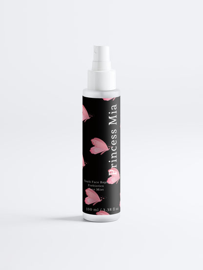 Spray bottle with black label featuring pink hearts on a white background