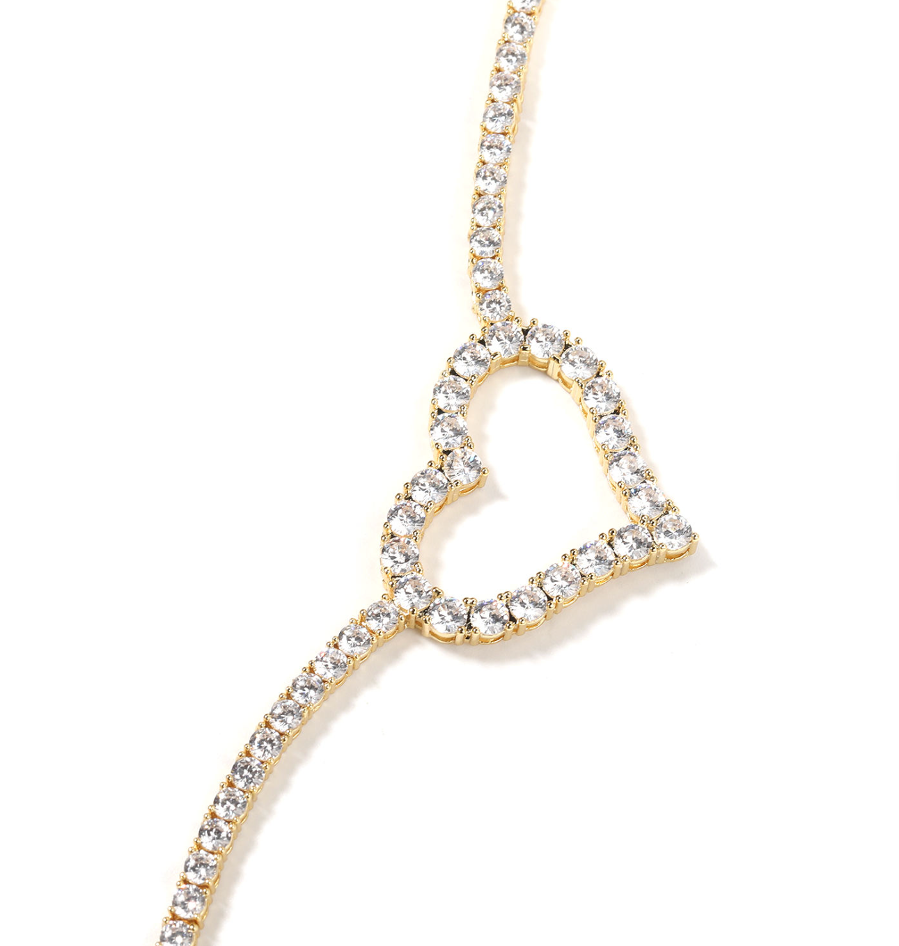 Heart-shaped necklace with clear stones on a white background