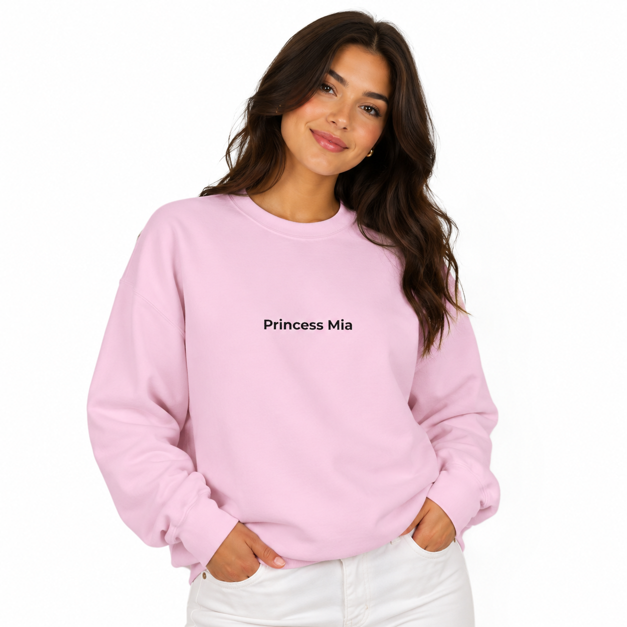 Woman wearing a pink sweatshirt with 'Princess Mia' text on a white background