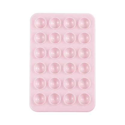 Pink silicone suction phone holder attached to smartphone for hands-free content creation and mirror selfies.